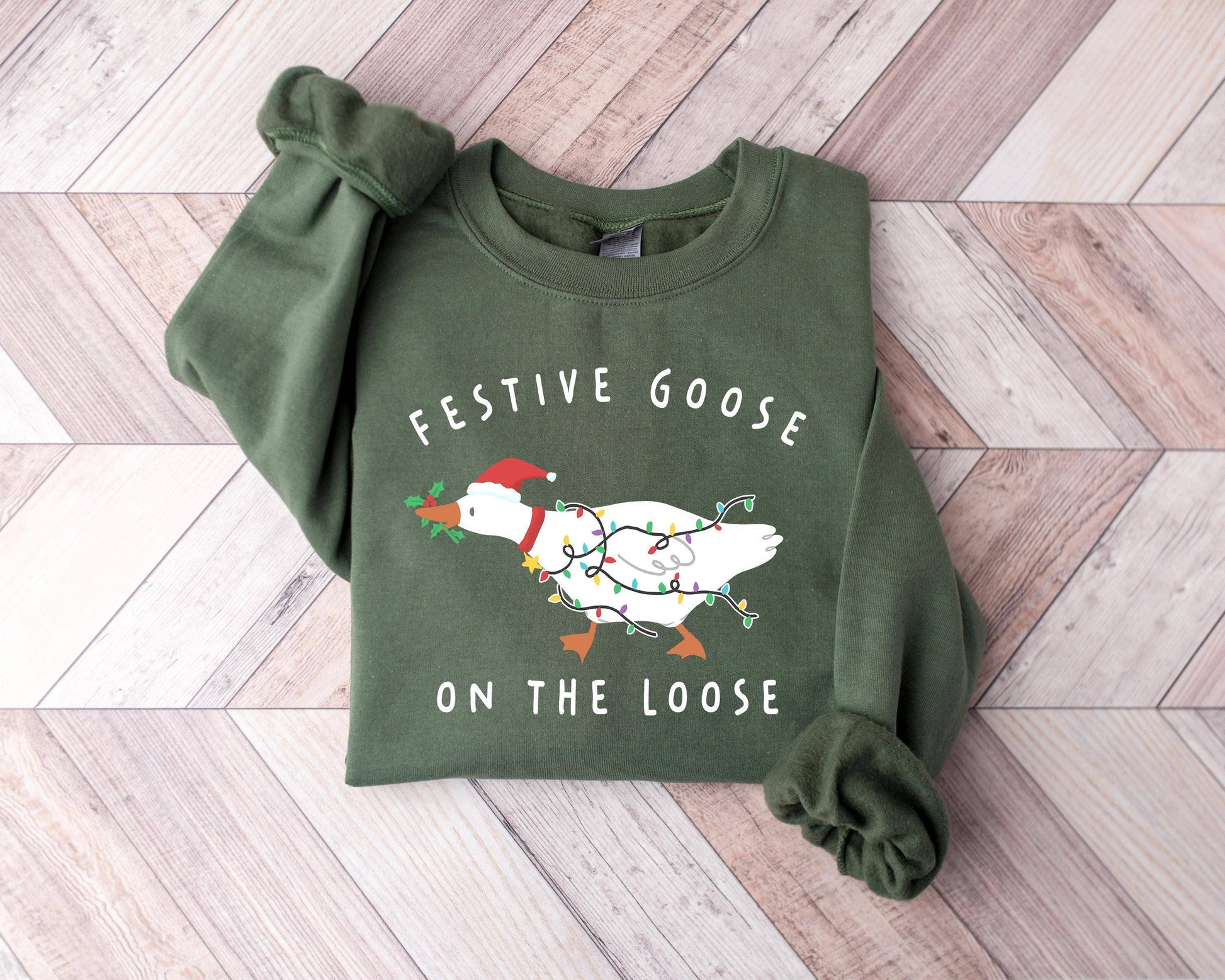 Festive Goose On the Loose Christmas Sweatshirt Unisex T-shirt, Sweatshirt, Hoodie, Long Sleeve Tee - T-Shirt, Sweatshirt, Hoodie