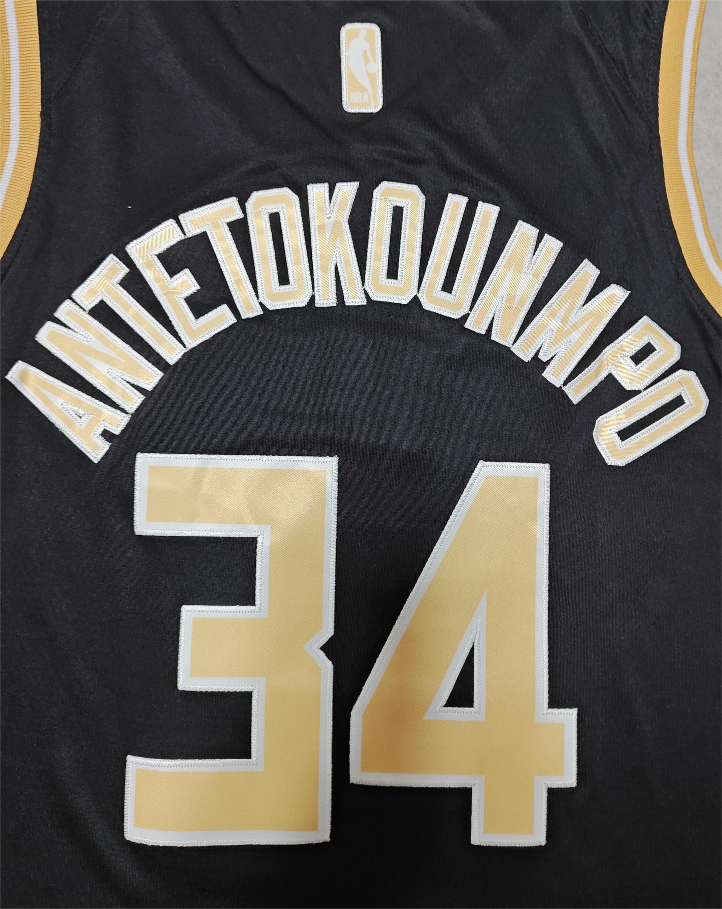 24 Bucks #34 Antetokounmpo Black and Gold Jersey sports jersey product view 3