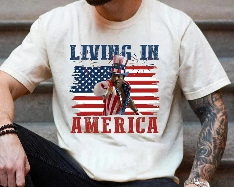 Apollo Creed Living In America T-shirt, Retro USA Shirt, 4th Of July Tee Unisex T-shirt, Sweatshirt, Hoodie, Long Sleeve Tee - T-Shirt, Sweatshirt, Hoodie