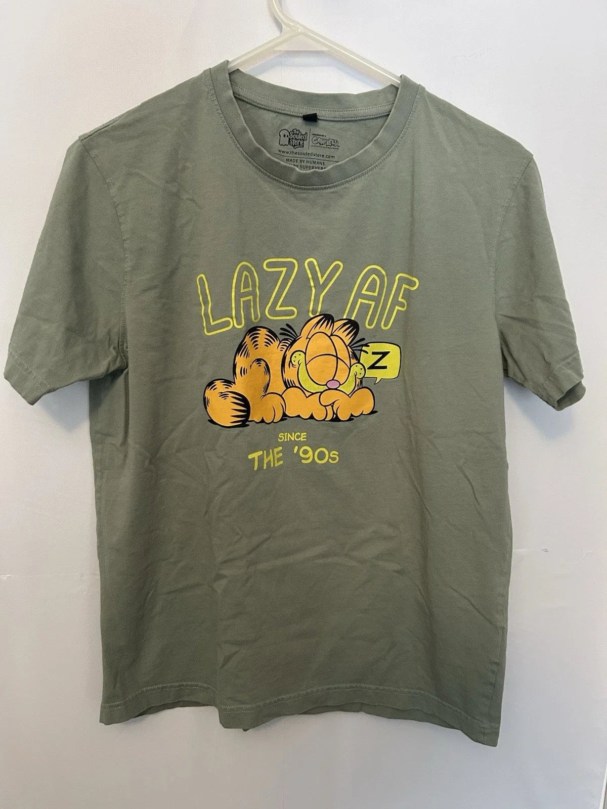 The Souled Store Garfield "Lazy AF Since The '90s" Sage Green T-Shirt Size Small Unisex T-shirt, Sweatshirt, Hoodie, Long Sleeve Tee - T-Shirt, Sweatshirt, Hoodie