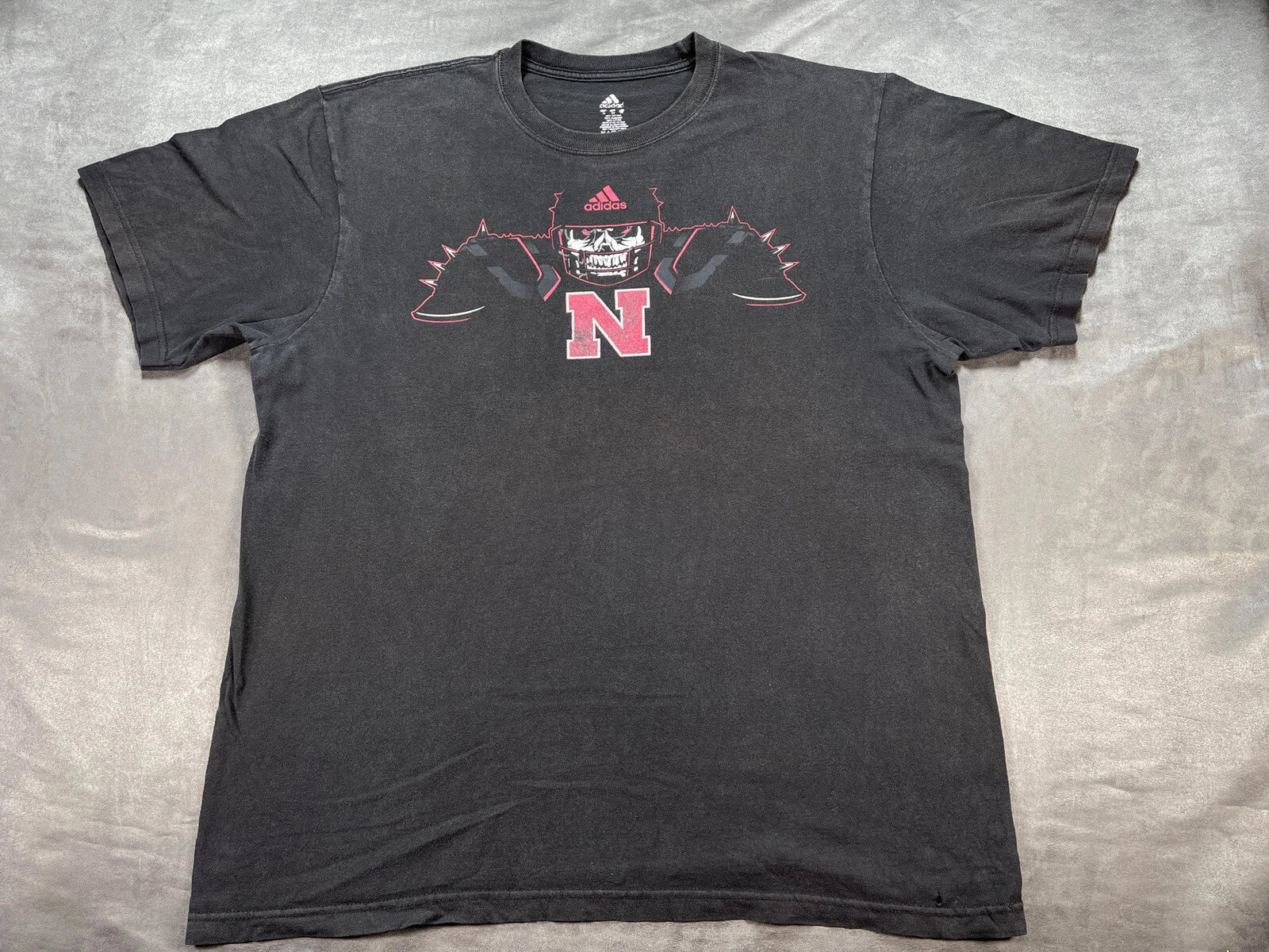 Nebraska Cornhuskers Football Skull Fashionably Faded Y2K Shirt Shoulder pads Unisex T-shirt, Sweatshirt, Hoodie, Long Sleeve Tee - T-Shirt, Sweatshirt, Hoodie