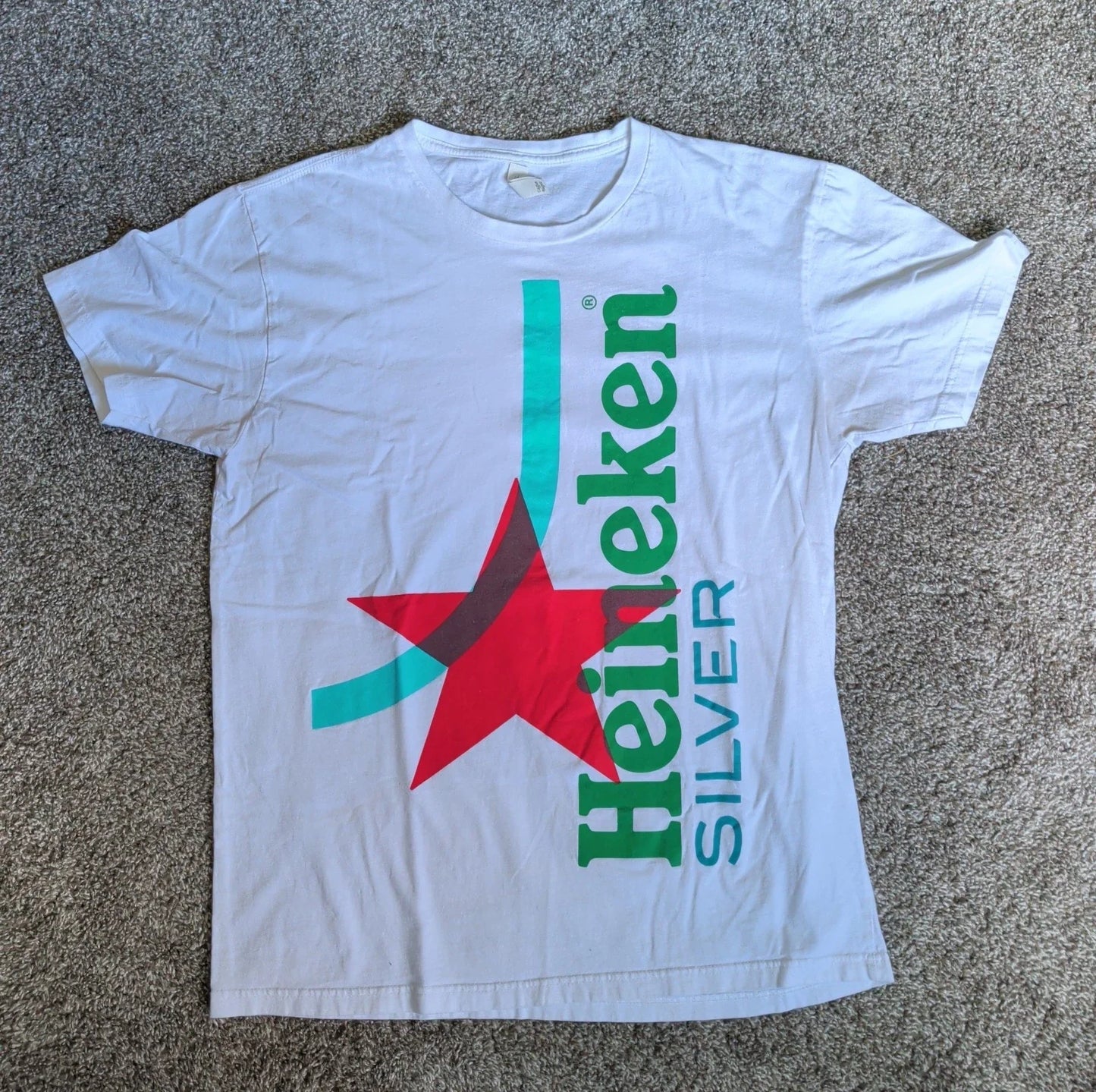 Heineken Silver White Size Large Short Sleeve Beer/Brewing Advertising Shirt Unisex T-shirt, Sweatshirt, Hoodie, Long Sleeve Tee - T-Shirt, Sweatshirt, Hoodie