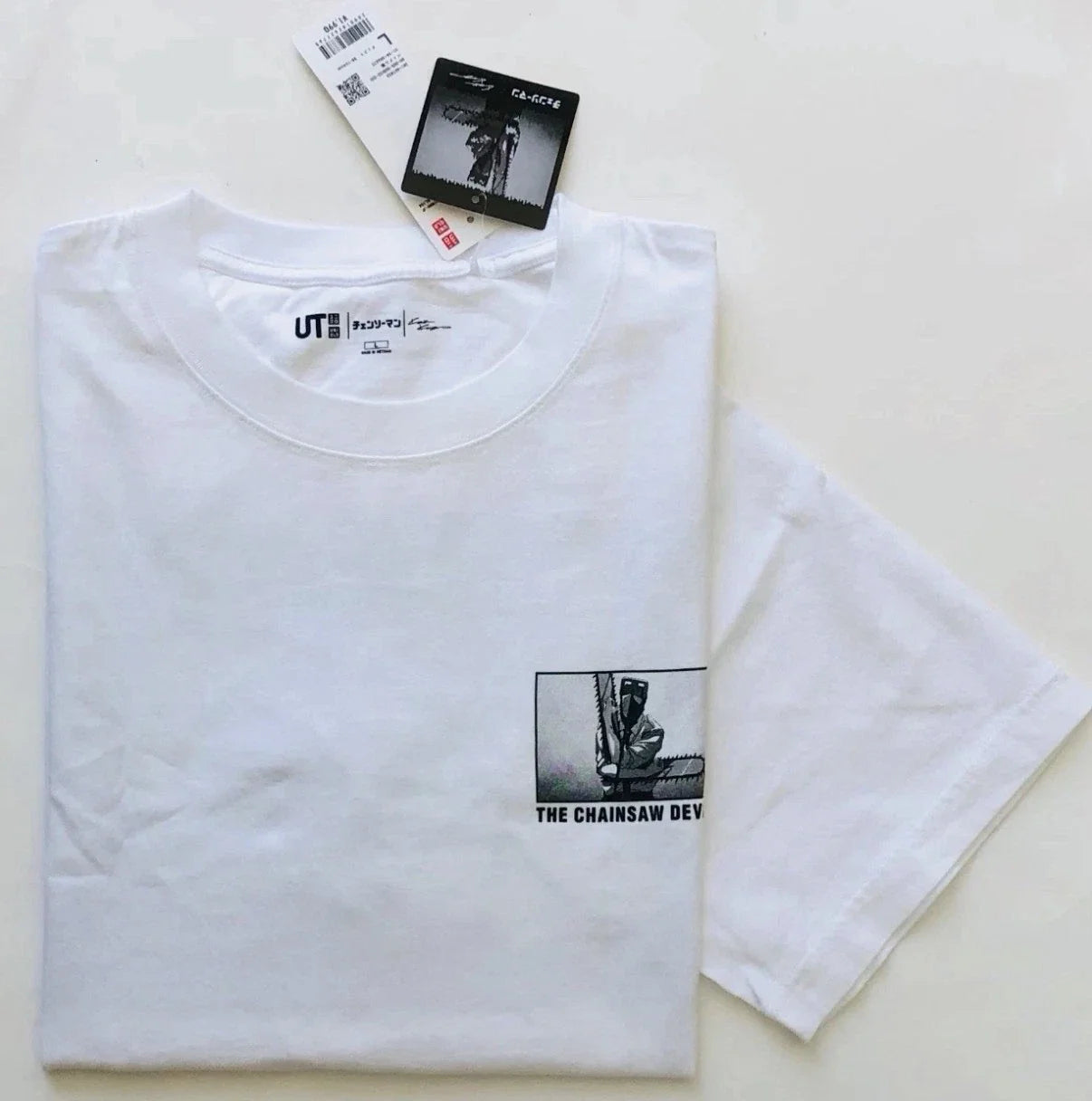 NWT UNIQLO OVERSIZED CHAINSAW KOSUKE KAWAMURA UTGRAPHIC T-SHIRTS | Size L Large Unisex T-shirt, Sweatshirt, Hoodie, Long Sleeve Tee - T-Shirt, Sweatshirt, Hoodie