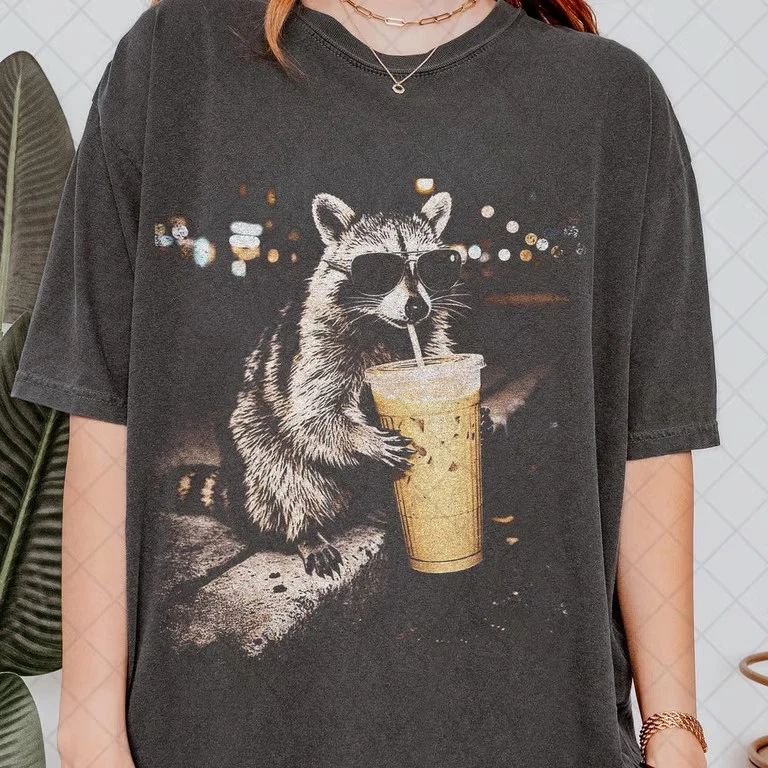 Raccoon Drinking Iced Coffee Shirt, Funny Animal Meme Tee, Coffee Lover Raccoon Unisex T-shirt, Sweatshirt, Hoodie, Long Sleeve Tee - T-Shirt, Sweatshirt, Hoodie