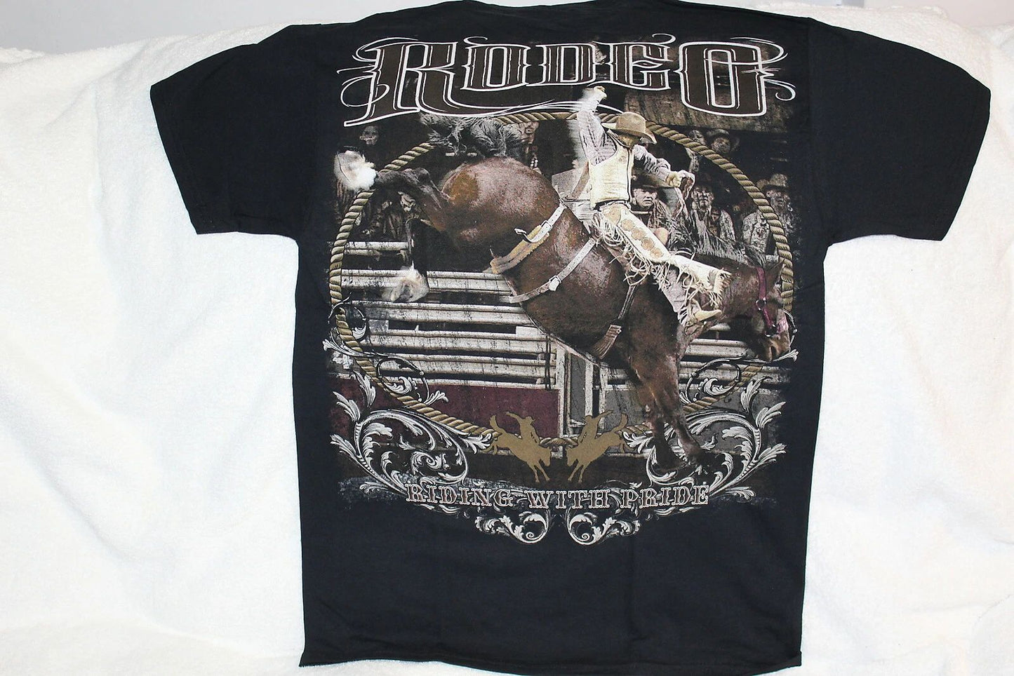 RODEO COWBOY RIDING BUCKING HORSE BRONCO RIDING WITH PRIDE T-SHIRT Unisex T-shirt, Sweatshirt, Hoodie, Long Sleeve Tee - T-Shirt, Sweatshirt, Hoodie