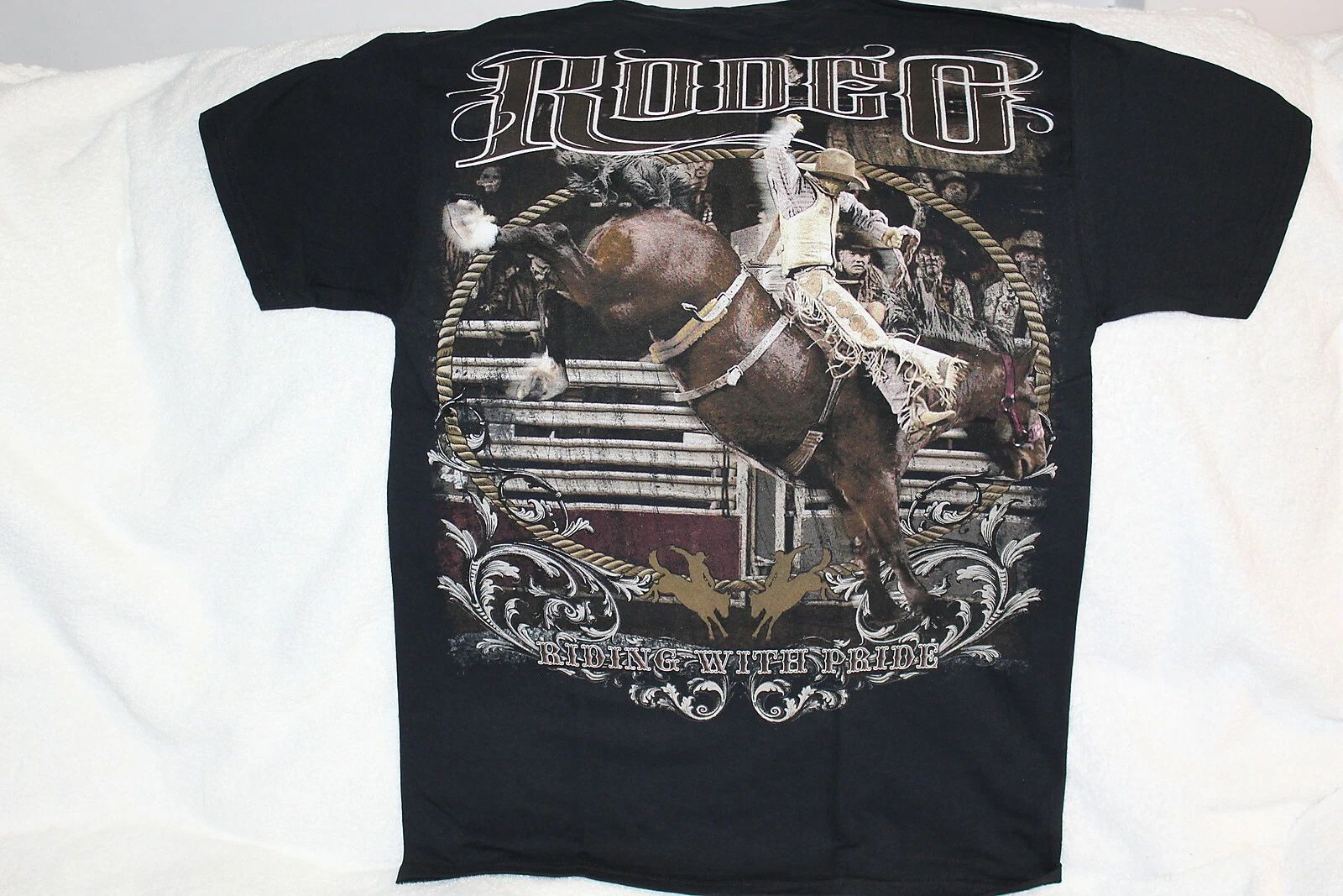 RODEO COWBOY RIDING BUCKING HORSE BRONCO RIDING WITH PRIDE T-SHIRT Unisex T-shirt, Sweatshirt, Hoodie, Long Sleeve Tee - T-Shirt, Sweatshirt, Hoodie