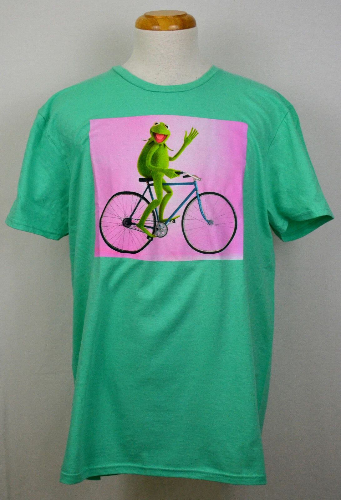 Kermit the Frog T-shirt Muppets Bicycle Riding Graphic Tee Turquoise Cotton NWT Unisex T-shirt, Sweatshirt, Hoodie, Long Sleeve Tee - T-Shirt, Sweatshirt, Hoodie