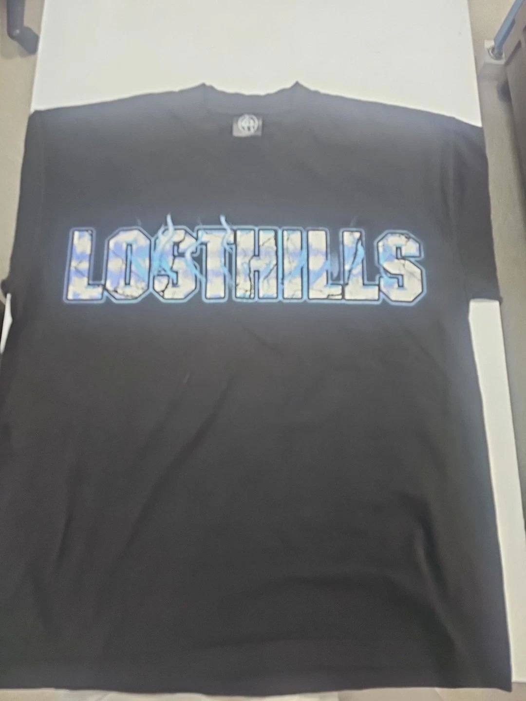 LOST HILLS  LOGO FRONT AND MIRROR STYLE LGO BACK BLACK MEN'S LG (OS) FIRE   Unisex T-shirt, Sweatshirt, Hoodie, Long Sleeve Tee - T-Shirt, Sweatshirt, Hoodie